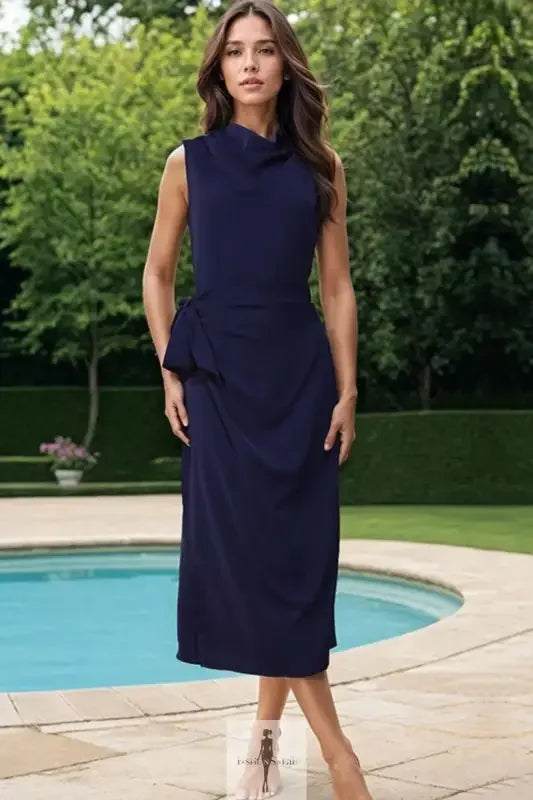 Navy blue sleeveless midi dress with cowl neck and twisted slit design
