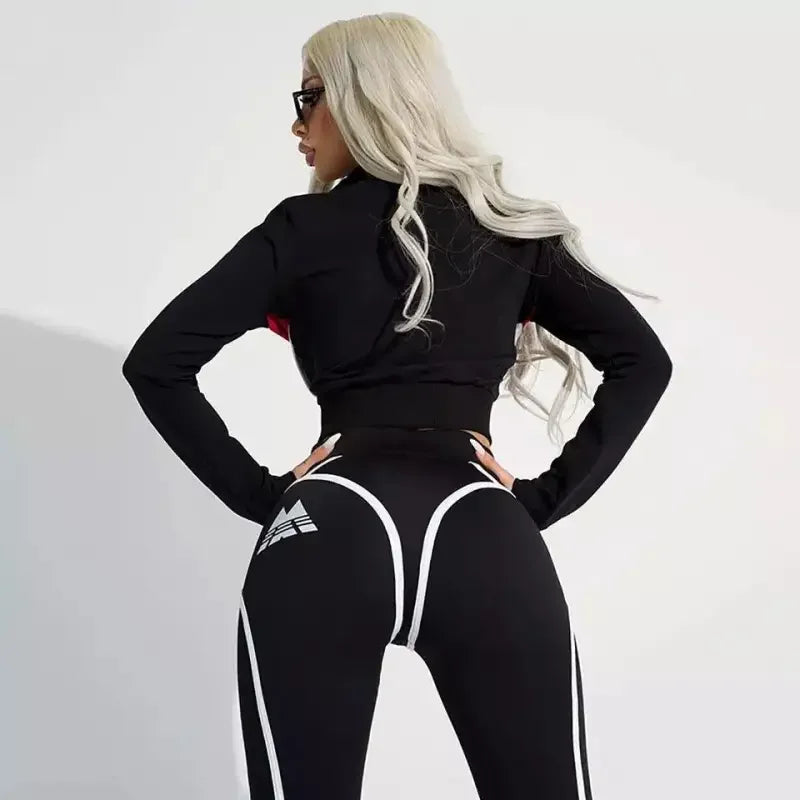 Woman in black athletic wear showcasing women pants from online boutique women’s fashion