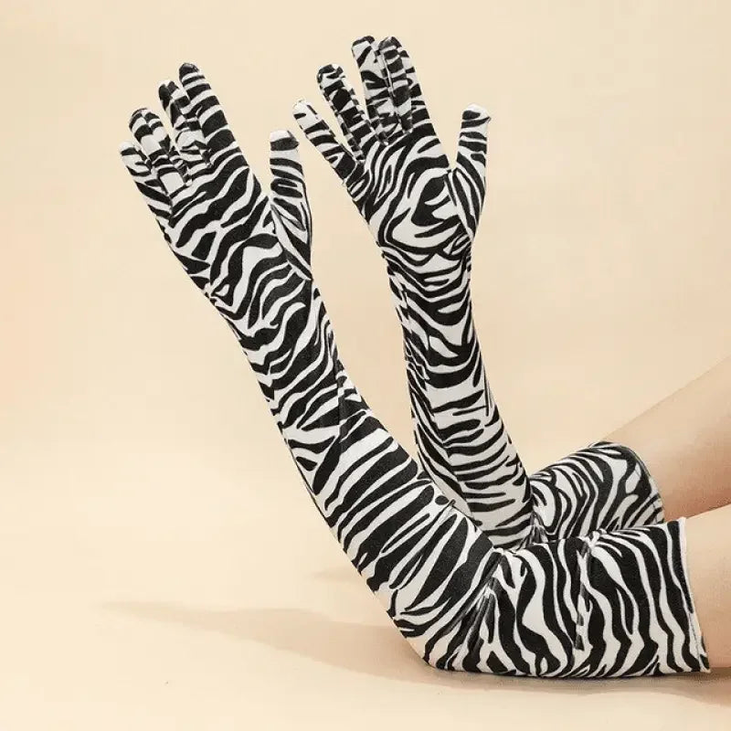 Zebra-striped arm-length fashion velvet gloves showcasing stylish velvet gloves design