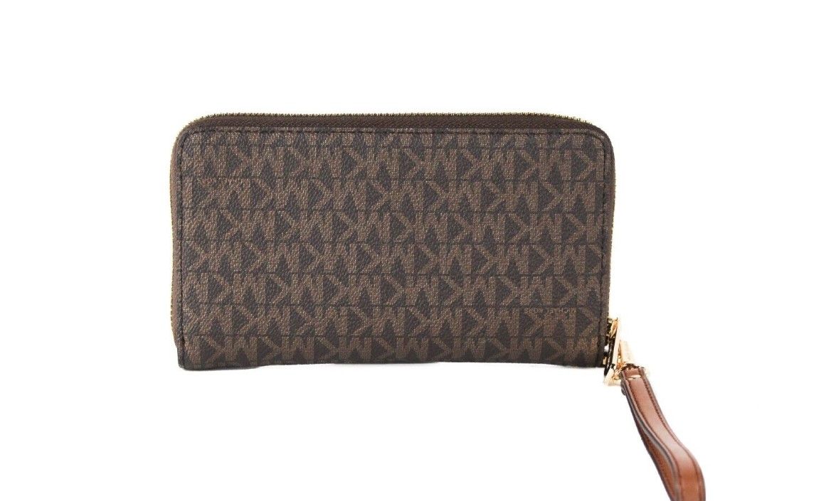 Michael Kors Jet Set Large Brown Signature PVC Flat Multifunction Wrist Wallet | Fashionsarah.com