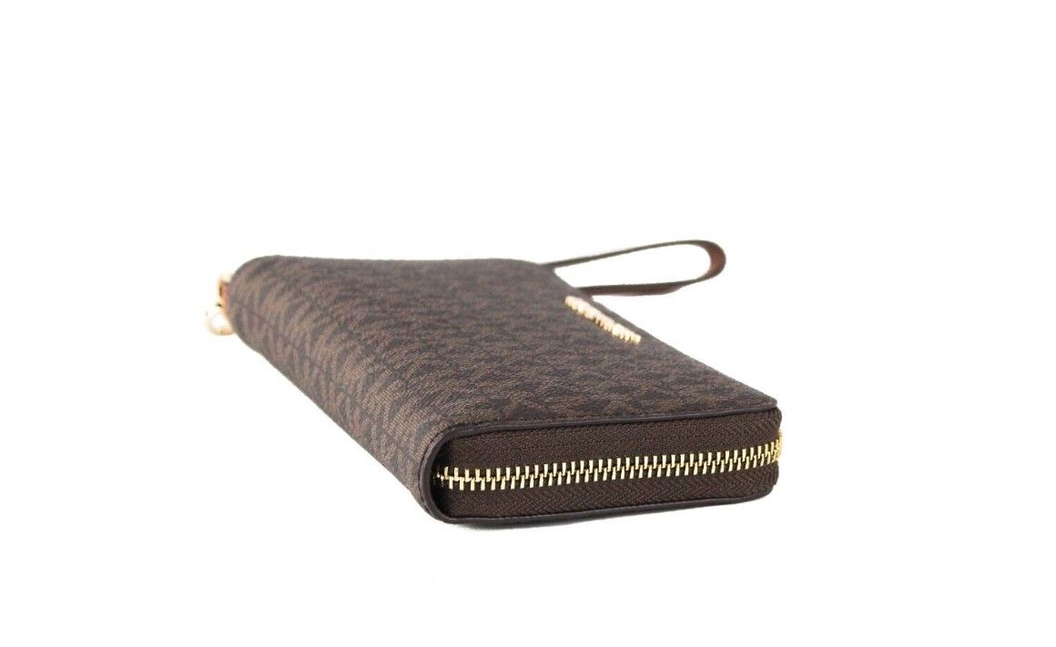 Michael Kors Jet Set Large Brown Signature PVC Flat Multifunction Wrist Wallet | Fashionsarah.com