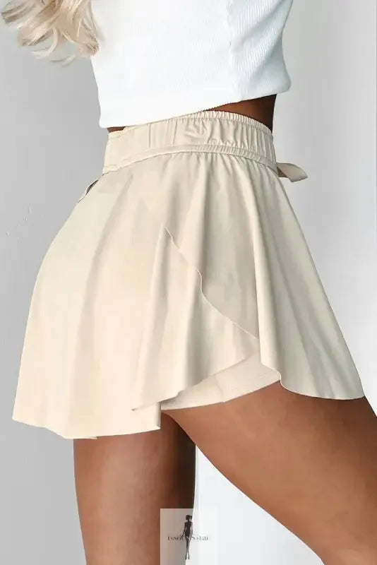 Beige drawstring high waist lined tennis skirt with elastic waistband
