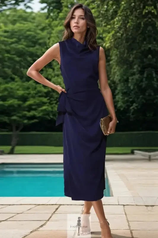 Navy blue sleeveless midi dress with twisted slit cowl neck design for elegant style