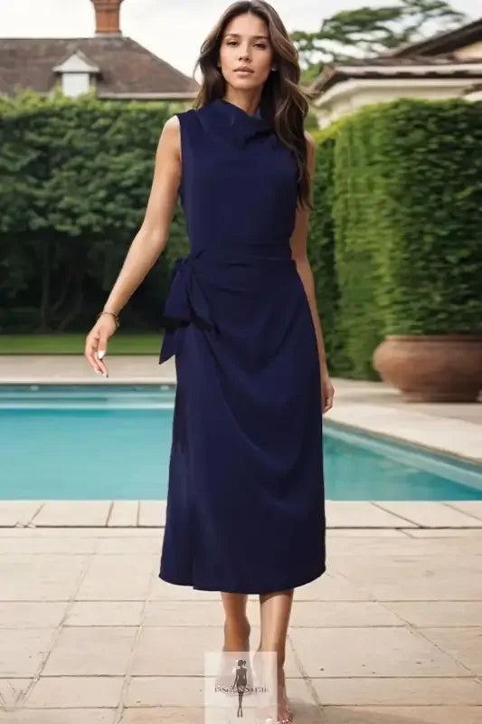 Navy blue sleeveless midi dress with twisted slit cowl neck for elegant occasions