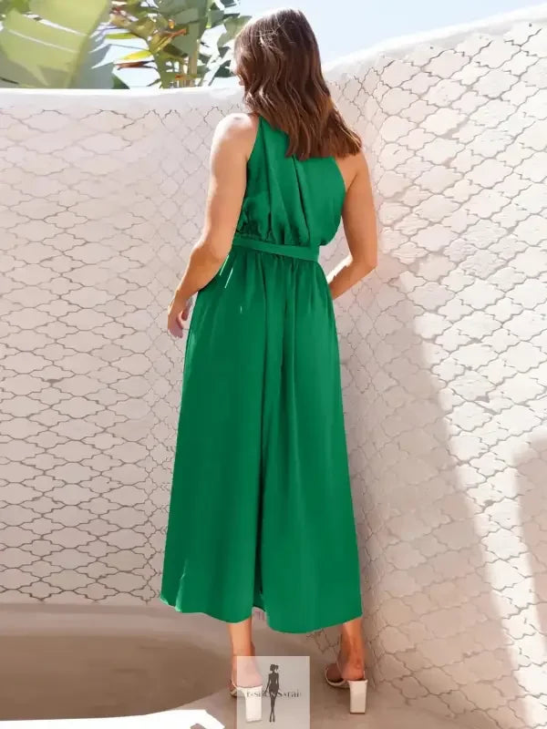 Green halter-neck jumpsuit styled as a single shoulder midi dress for midi dress fashionsarah