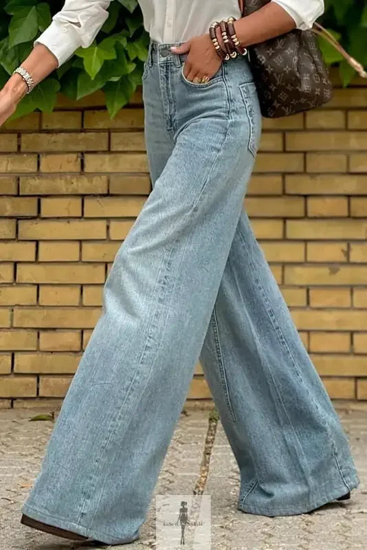Blue wide leg high waist women jeans displayed in a product image