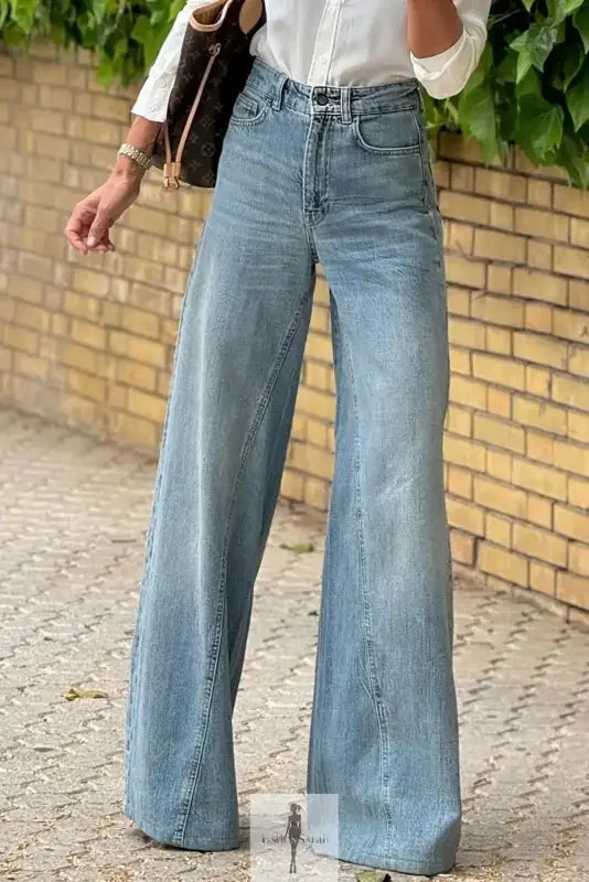 Blue wide leg high waist women jeans with a relaxed fit and light denim wash