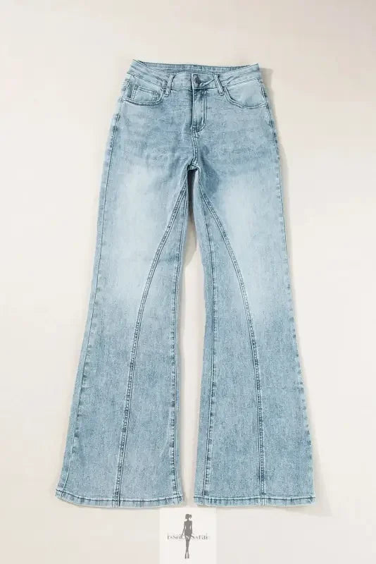 Light wash blue wide leg high waist women jeans displayed in a stylish product image