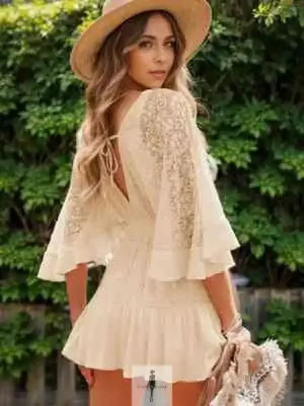 Lace cutout half sleeve mini dress with boho-chic design and intricate lace details