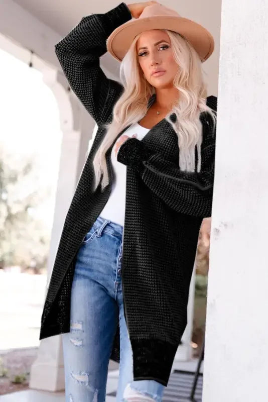 Woman wearing fashionsarah Gray and White Duster Cardigan in black with hat