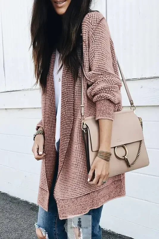 Pink textured duster cardigan with knit pockets from Fashionsarah and beige handbag