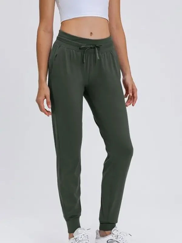 Olive green tied joggers with pockets from Fashionsarah online boutique