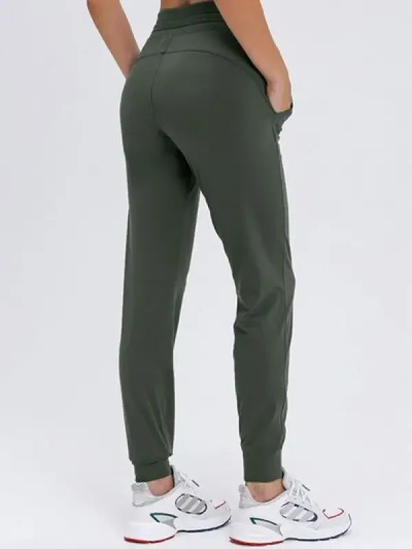 Olive green tied joggers with pockets from Fashionsarah online boutique