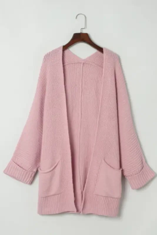 Pink oversized sweater cardigan with pockets available at Online Boutique