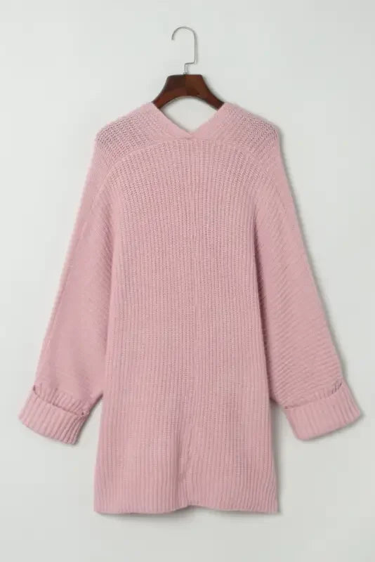 Pink oversized knit sweater cardigan from online boutique, perfect for stylish comfort