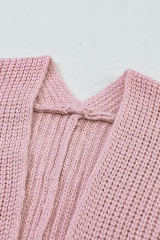 Pink oversized sweater cardigan from Pink Oversized Knit Sweater Cardigan at an online boutique
