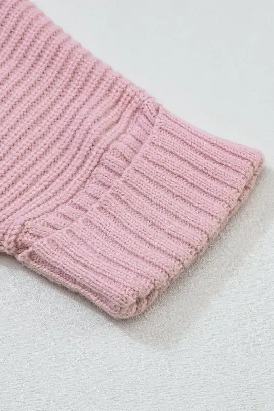 Pink ribbed knit sleeve of the Pink Oversized Knit Sweater Cardigan at the online boutique