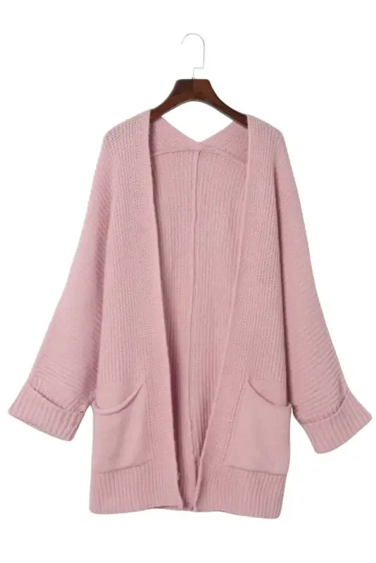 Pink oversized knit sweater cardigan with pockets from online boutique