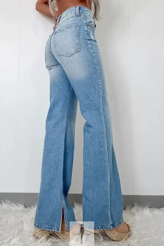 Light-wash denim split-hem flare jeans in high rise straight jeans style