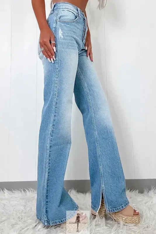 Light wash high rise straight jeans with wide legs and side slits for stylish comfort