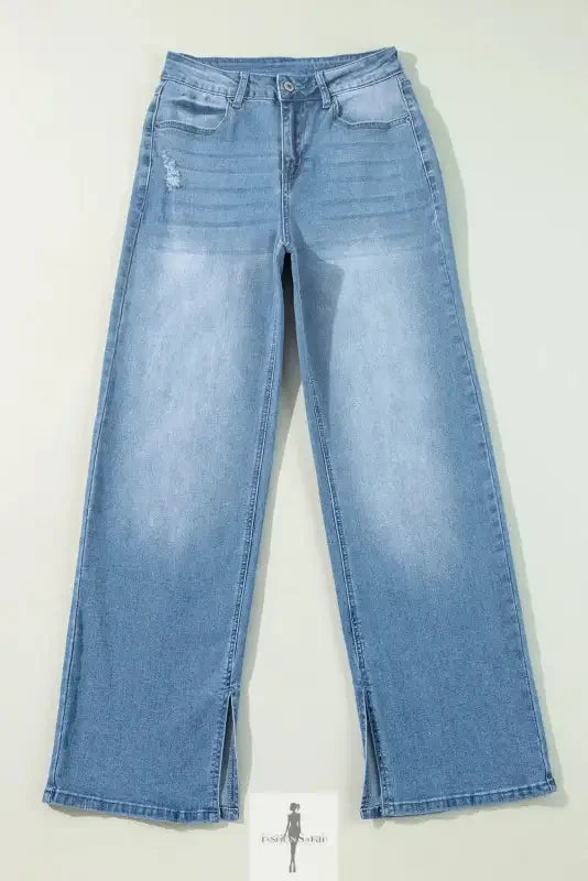 Light blue high rise straight jeans with wide-leg and ankle slits for stylish appeal