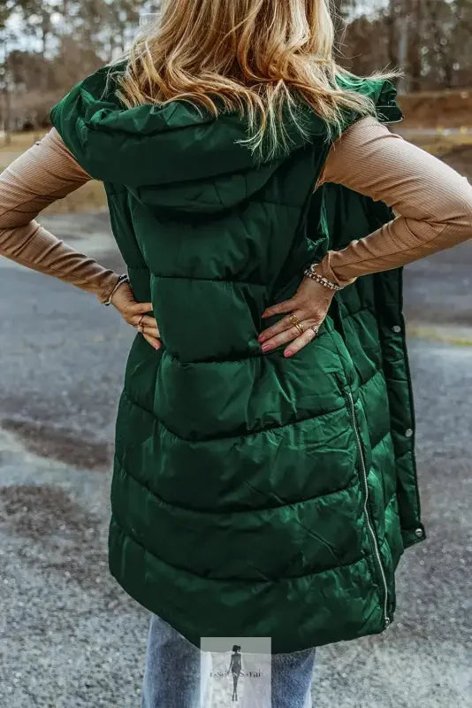 Green hooded long quilted vest coat featuring a stylish hooded long quilt design