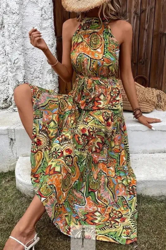 Colorful tied floral sleeveless dress from Fashionsarah featuring a maxi style