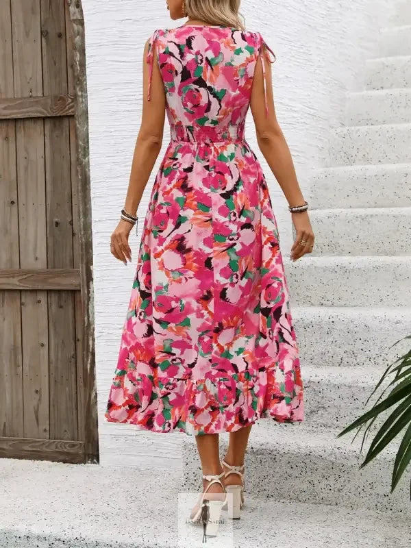 Floral print midi dress with ruffled smocked sleeveless design from online boutique