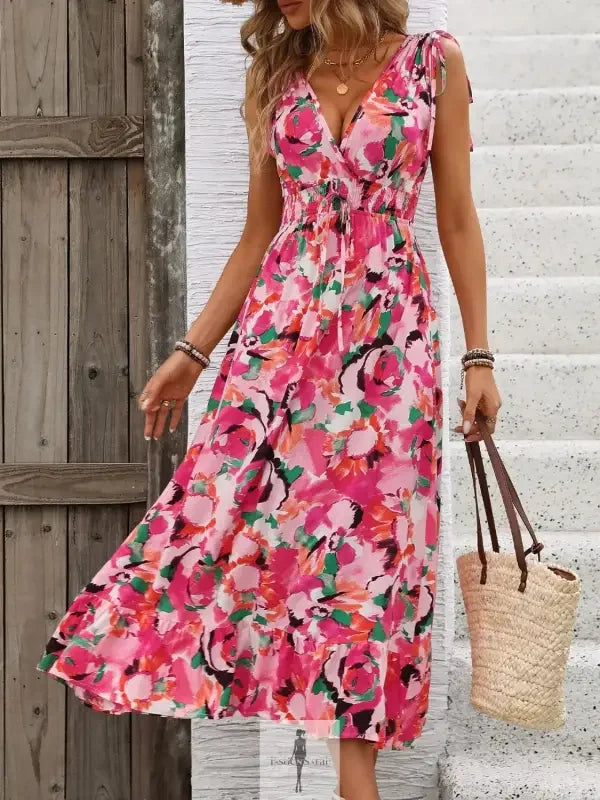 Floral print midi dress with ruffled smocked details, sleeveless style from online boutique