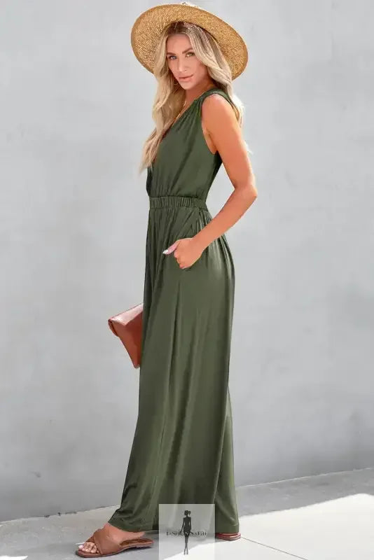 Olive green Deep V Wide Leg Jumpsuit with straw hat, stylish wide leg jumpsuit ensemble