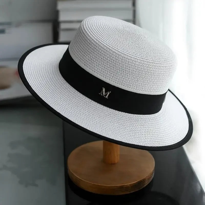 White straw boater sun hat with black band, ideal beach sun hats and beach sun accessories