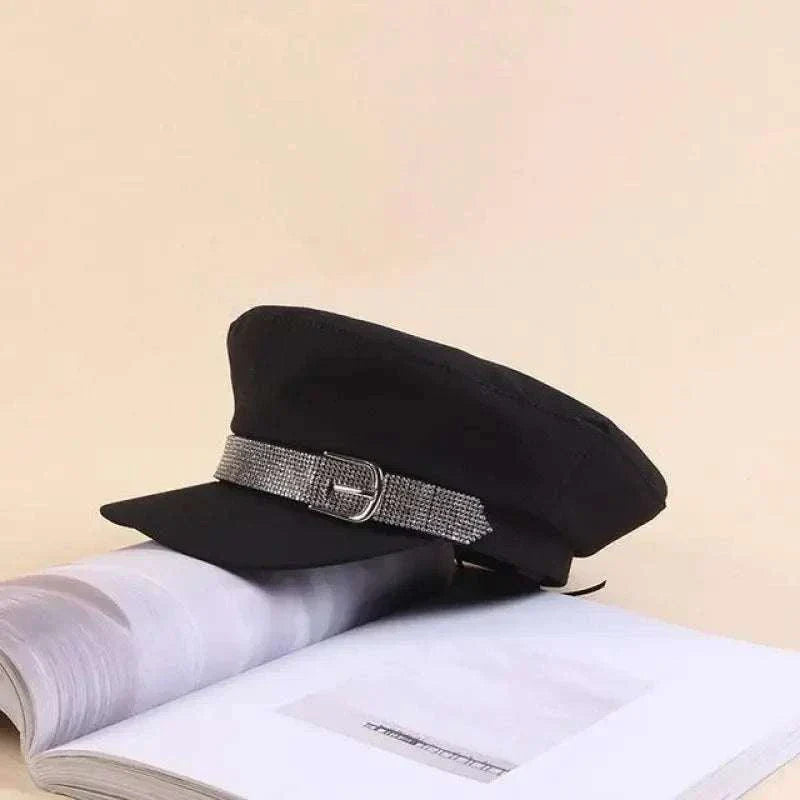 Black rhinestone cadet hat with buckle detail on white background