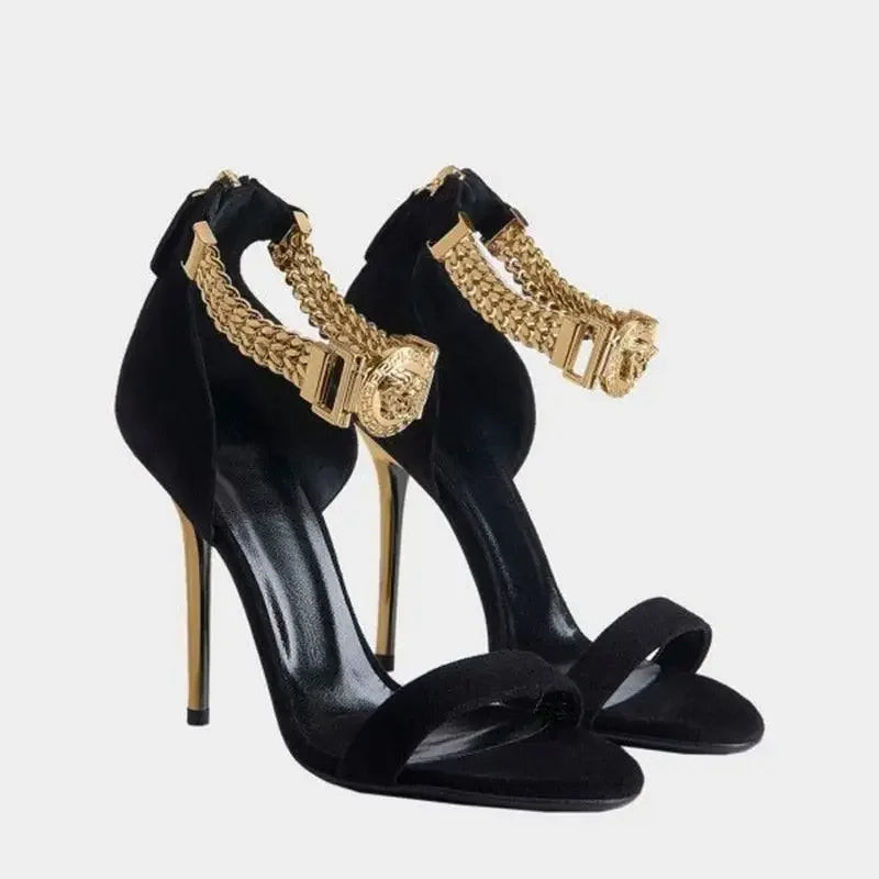 Black high-heeled sandals with gold chain ankle straps from Black and Gold Luxury Crystal Stilettos collection