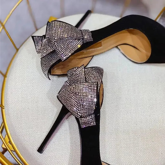 Black luxury butterfly heels with rhinestone bows for elegant evening wear