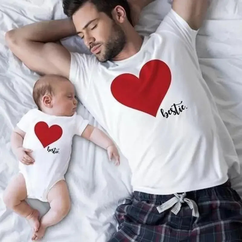 Family love matching sleepwear featuring father and baby heart-themed matching t-shirts