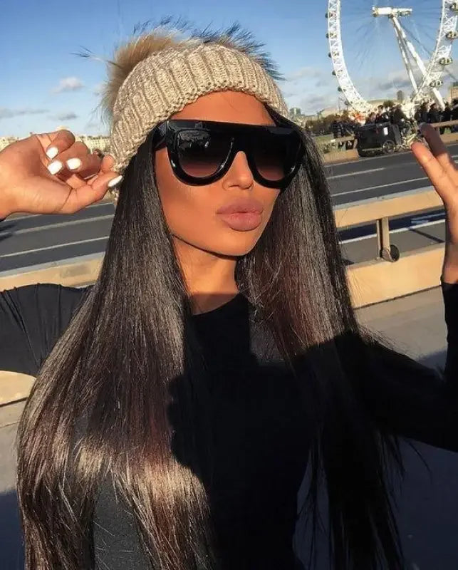 Woman wearing sunglasses and beanie at Black Sunglasses Online Fashion Boutique, online fashion style