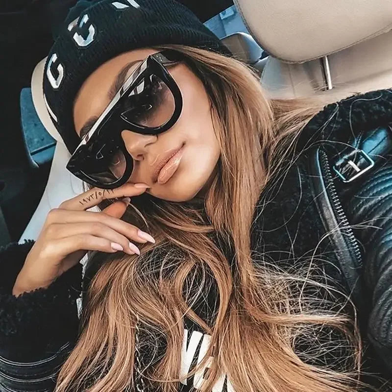 Stylish black sunglasses from Black Sunglasses Online Fashion Boutique, a leading fashion boutique