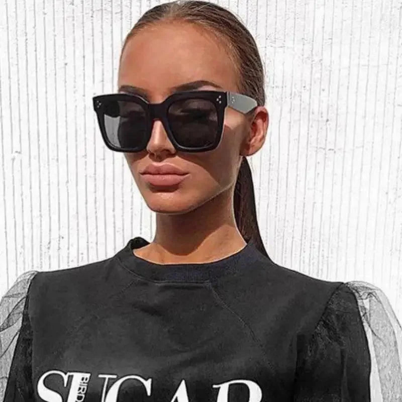 Black luxury square sunglasses with a sleek design for sophisticated style
