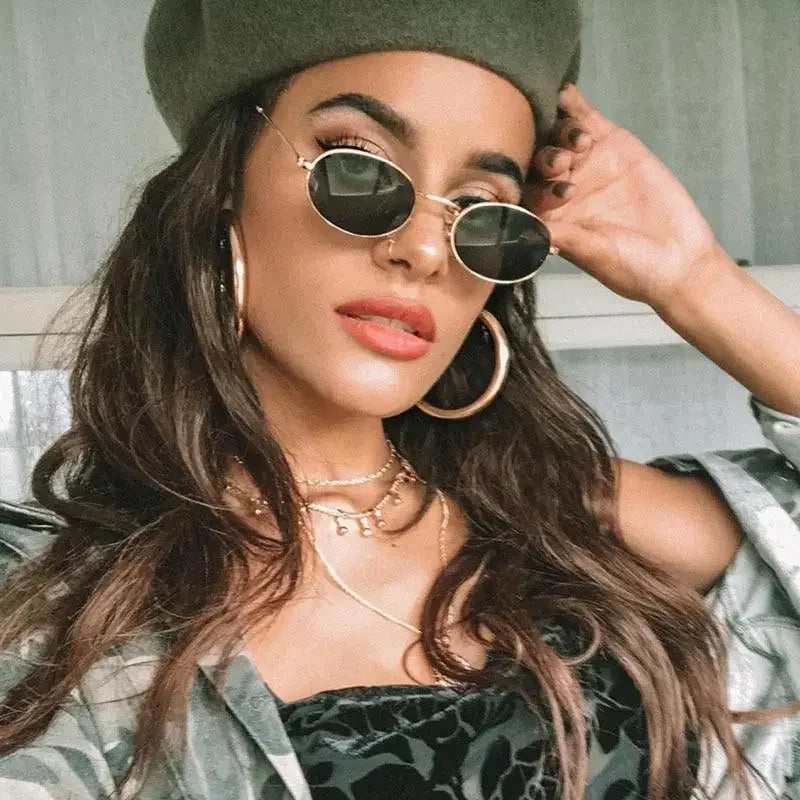 Stylish woman wearing Gold Frame Street Oval Sunglasses with beret and sunglasses