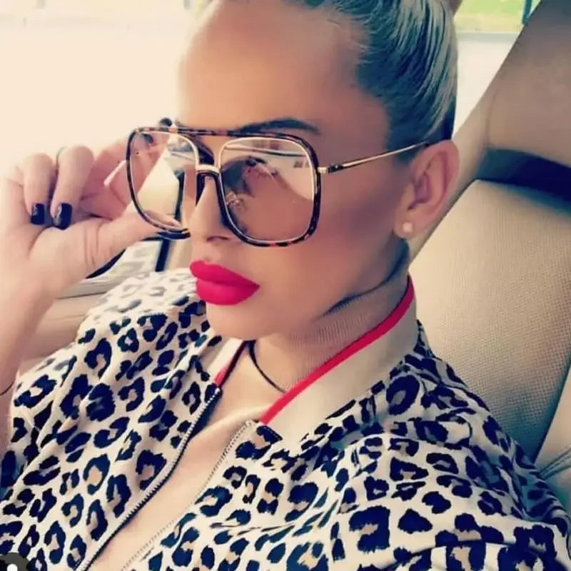 Woman wearing White Cap Oversized Retro Sunglasses showcasing stylish retro sunglasses