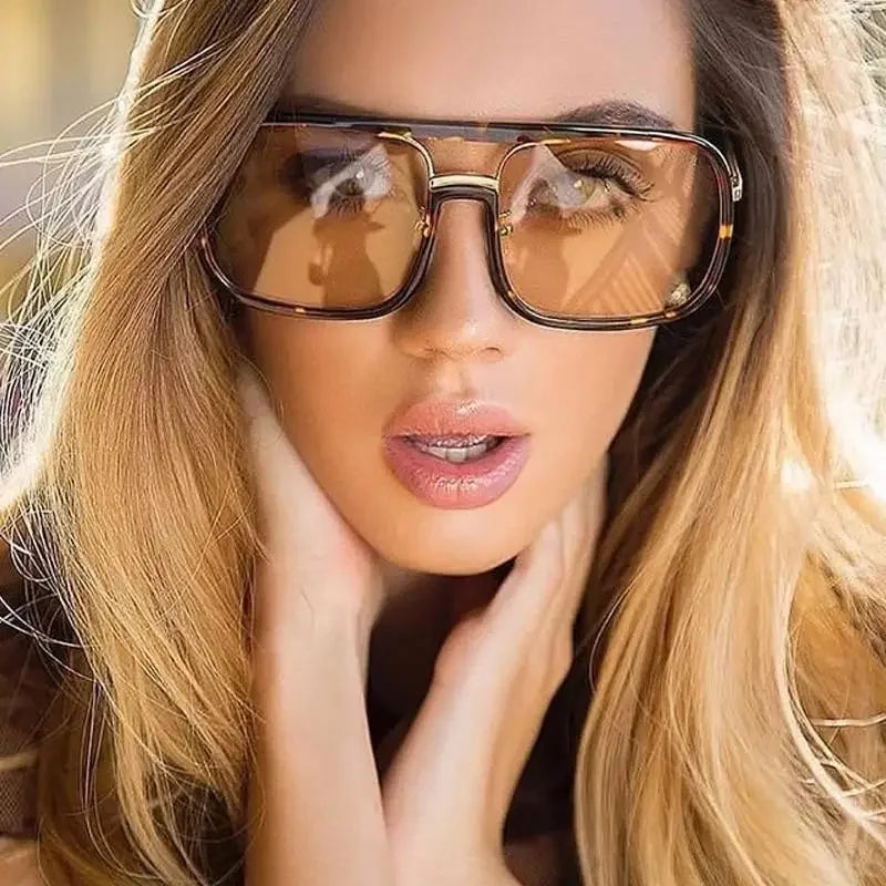 Oversized retro sunglasses in white cap style, featuring classic aviator design