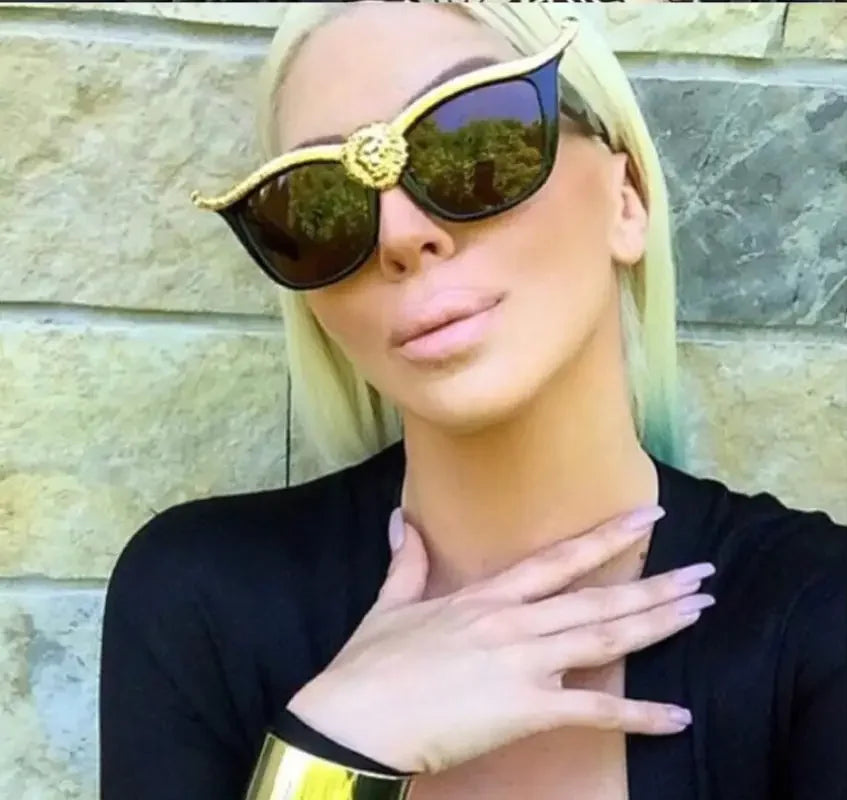 Blue Haired Woman with Lion Head Sunglasses featuring wild lion head gold accents