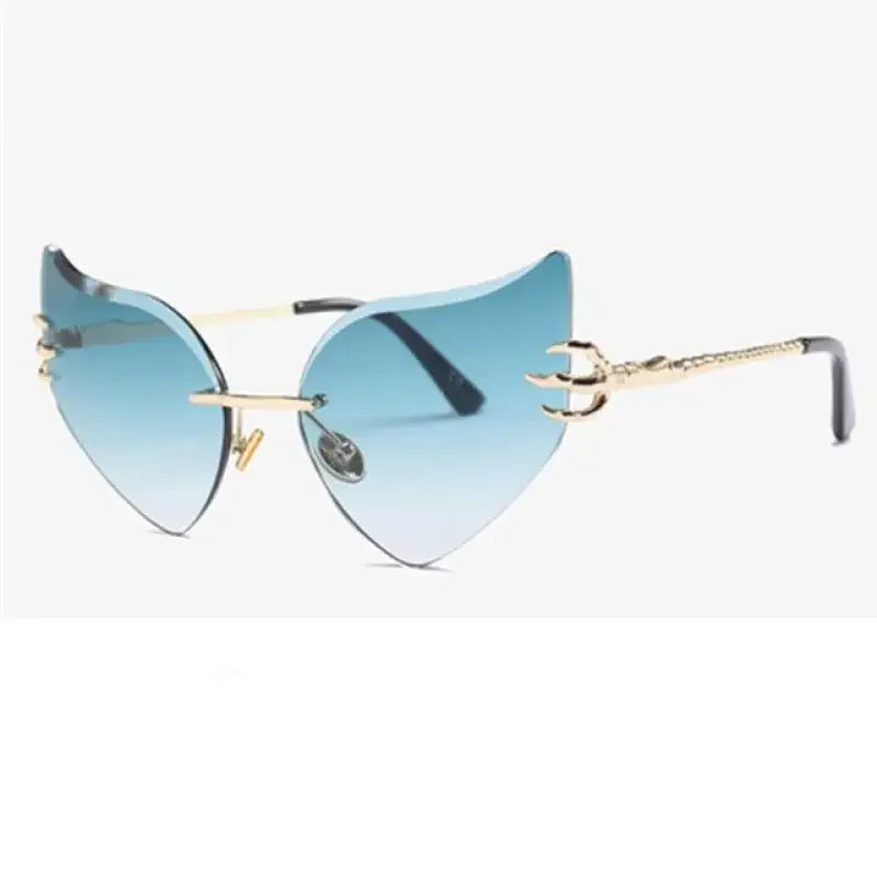 Rimless cat sunglasses with blue pink gradient lenses and gold trident accents