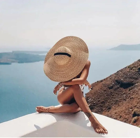 Oversized wide brim straw hats for sun protection and fashion style