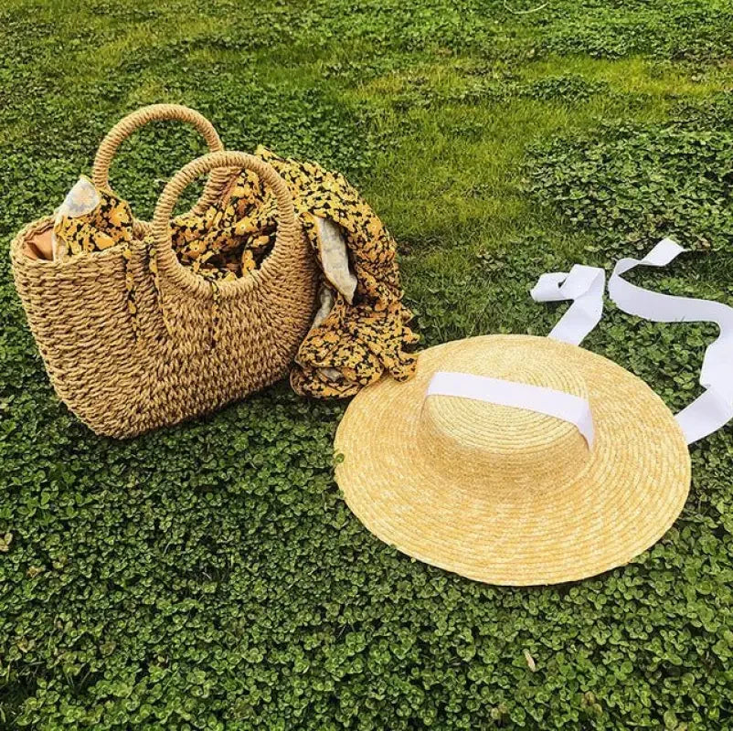 Wide brim straw hats featuring a straw sun hat with white ribbon for stylish protection