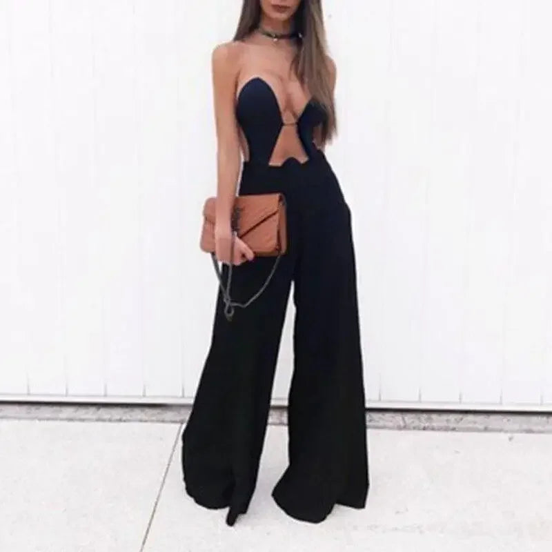 Black strapless jumpsuit with brown purse, perfect for women’s fashion at Transparent Monokini online boutique