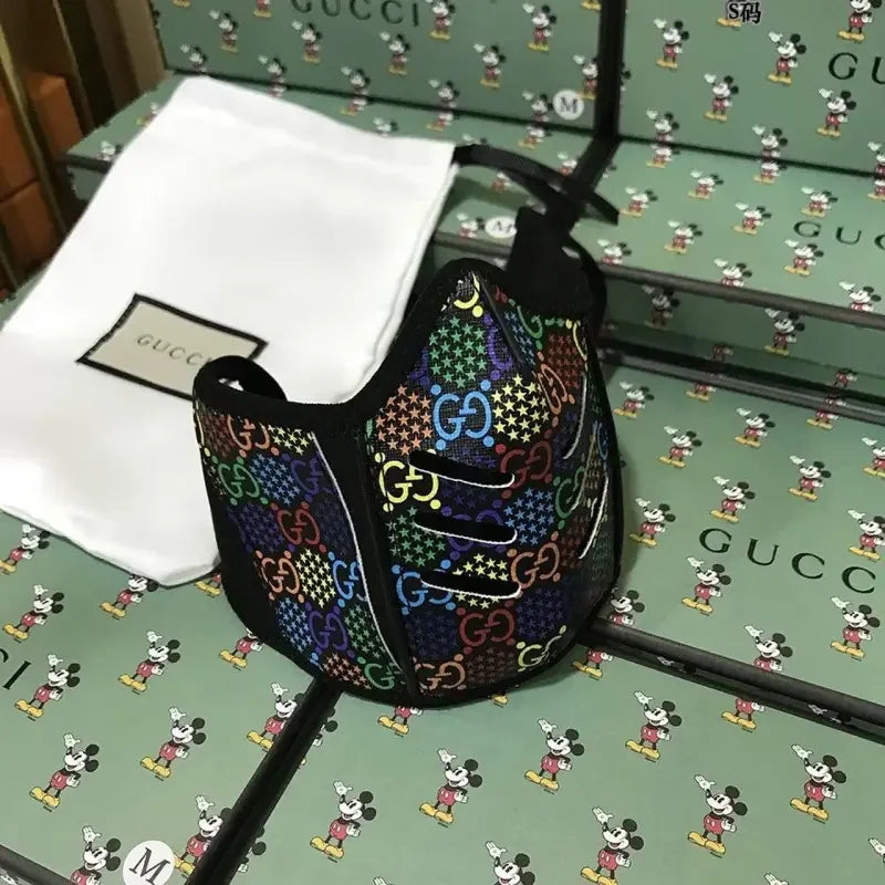 Luxury Gucci mask with distinctive patterned design for fashionable face covering by Fashionsarah