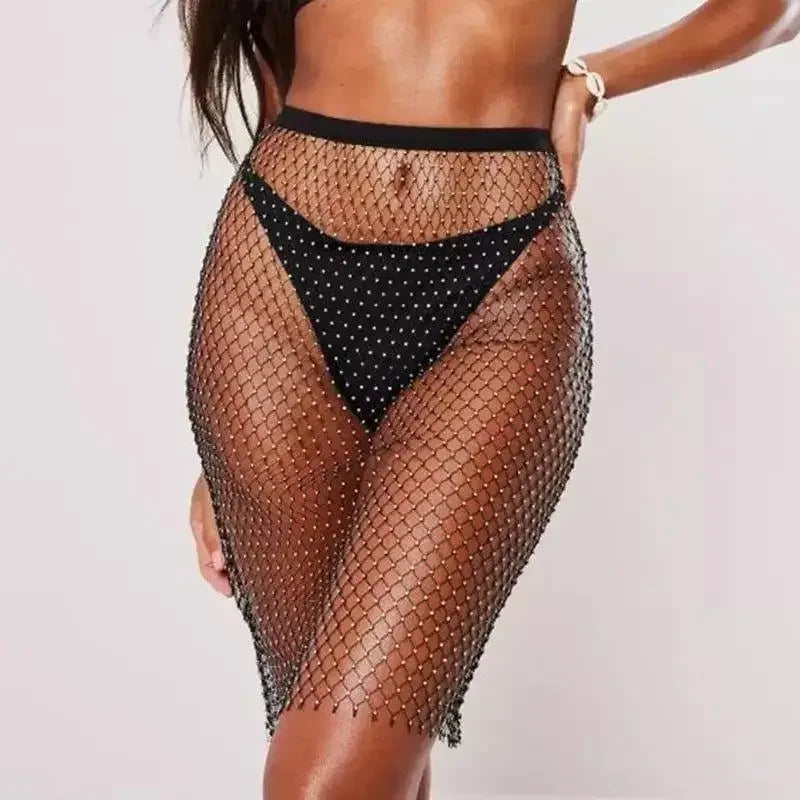 Black fishnet rhinestone skirt from Rhinestone Skirt available at online boutique for women’s fashion
