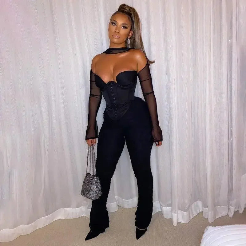 Woman in black corset crop jumpsuit from online boutique women’s fashion collection