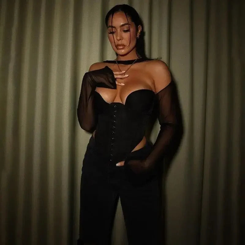 Elegant woman wearing a black corset crop top from our online boutique women’s fashion collection